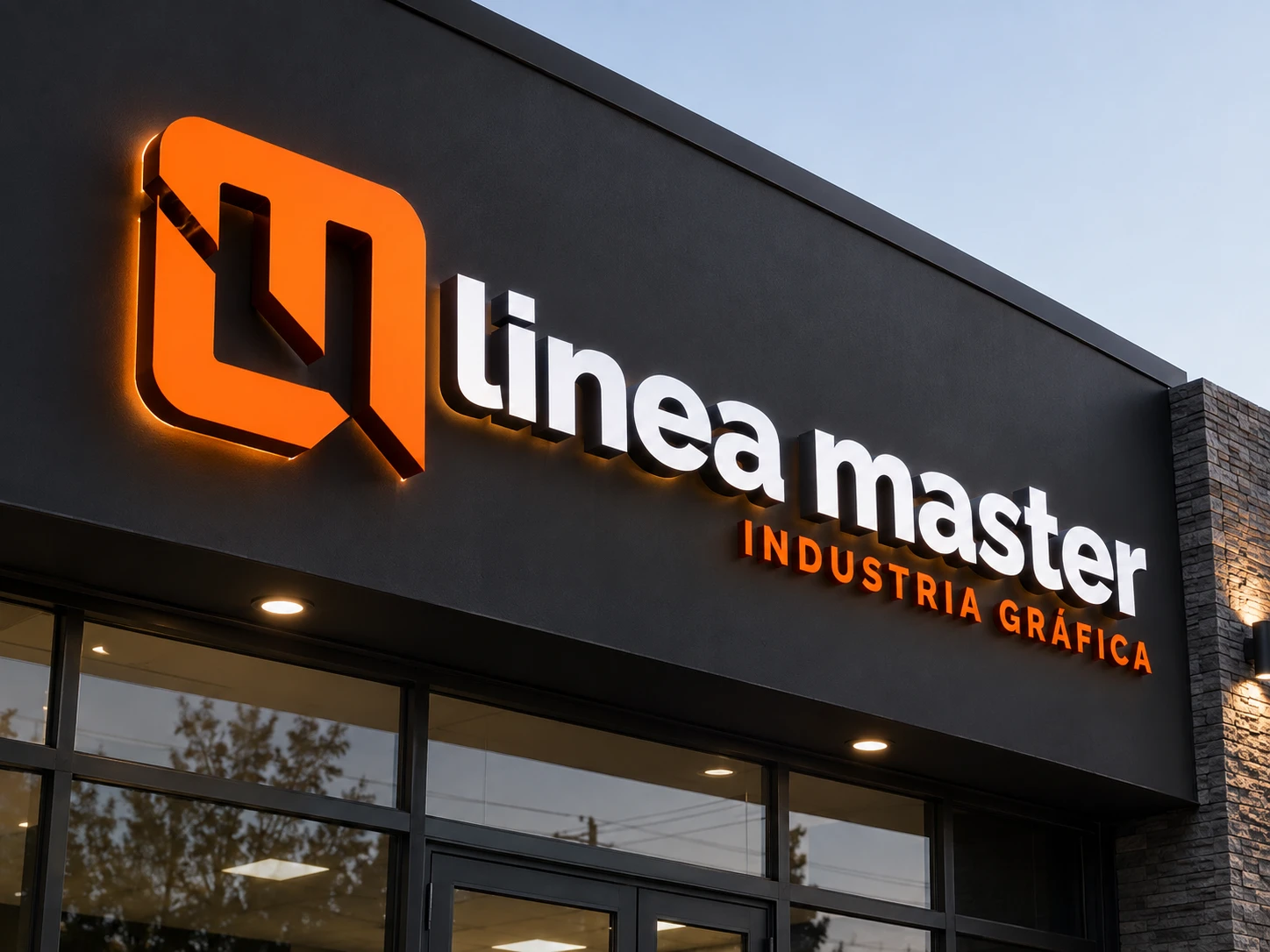 Letras corpóreas retroiluminadas de Linea Master en una fachada negra